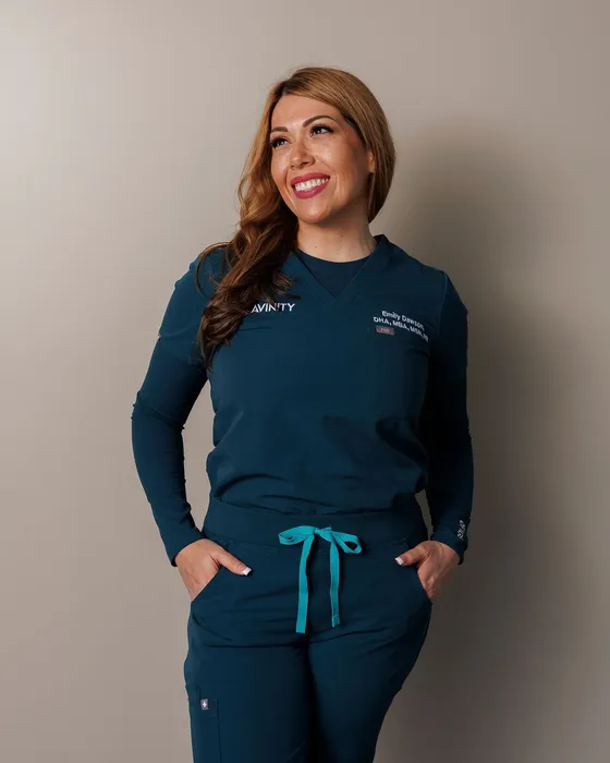Emily Dawson, DHA, MBA, MSN, RN, Co-founder and Clinical Director of Avinity Health, in Avinity scrubs
