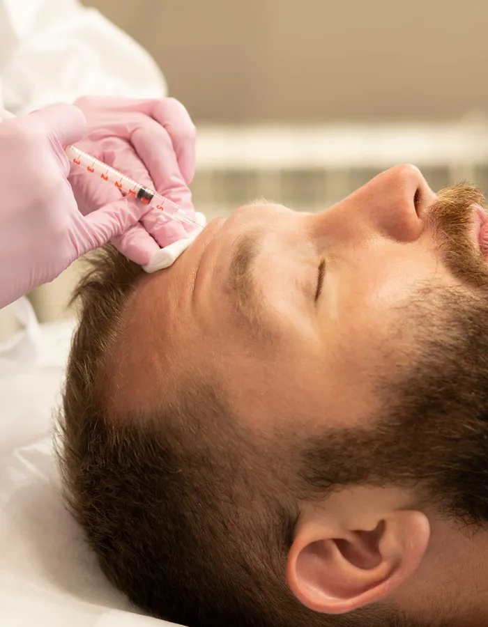 Male patient receiving Botox jaw injection at Avinity Health Scottsdale