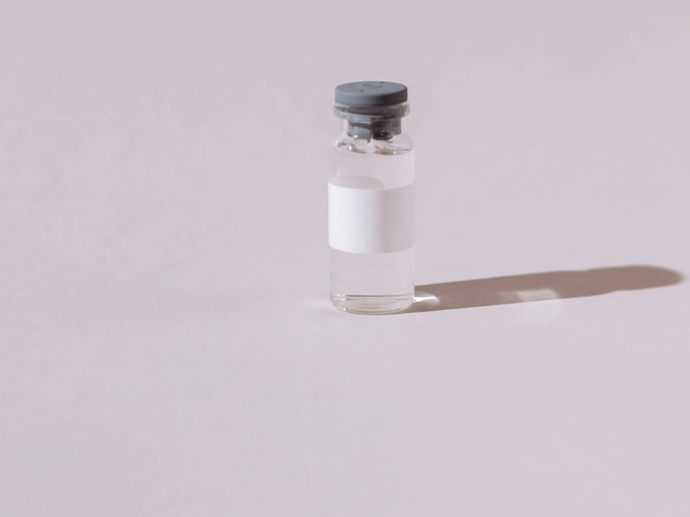 Clear injectable medication vial of the kind used for testosterone therapy