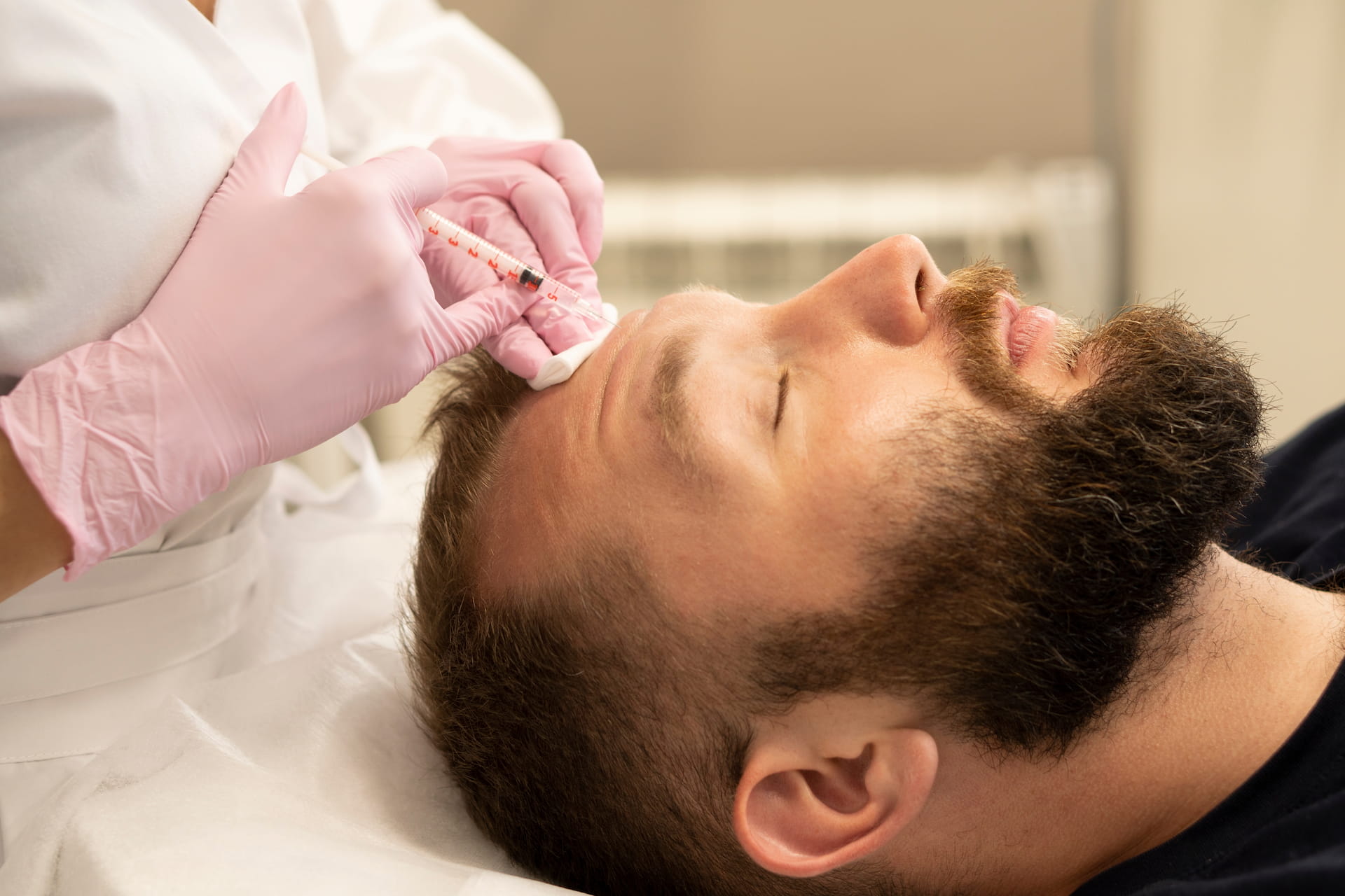 Male patient receiving Botox jaw injection at Avinity Health Scottsdale