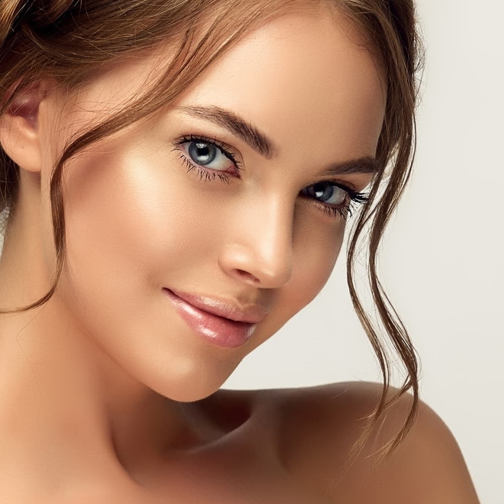 Example of overdone filler — too much volume without proportion planning