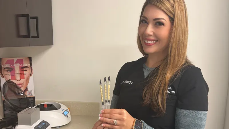 An Avinity Health registered nurse in Scottsdale holding prepared plasma gel syringes beside the centrifuge and heater used to make Selphyller Gel.